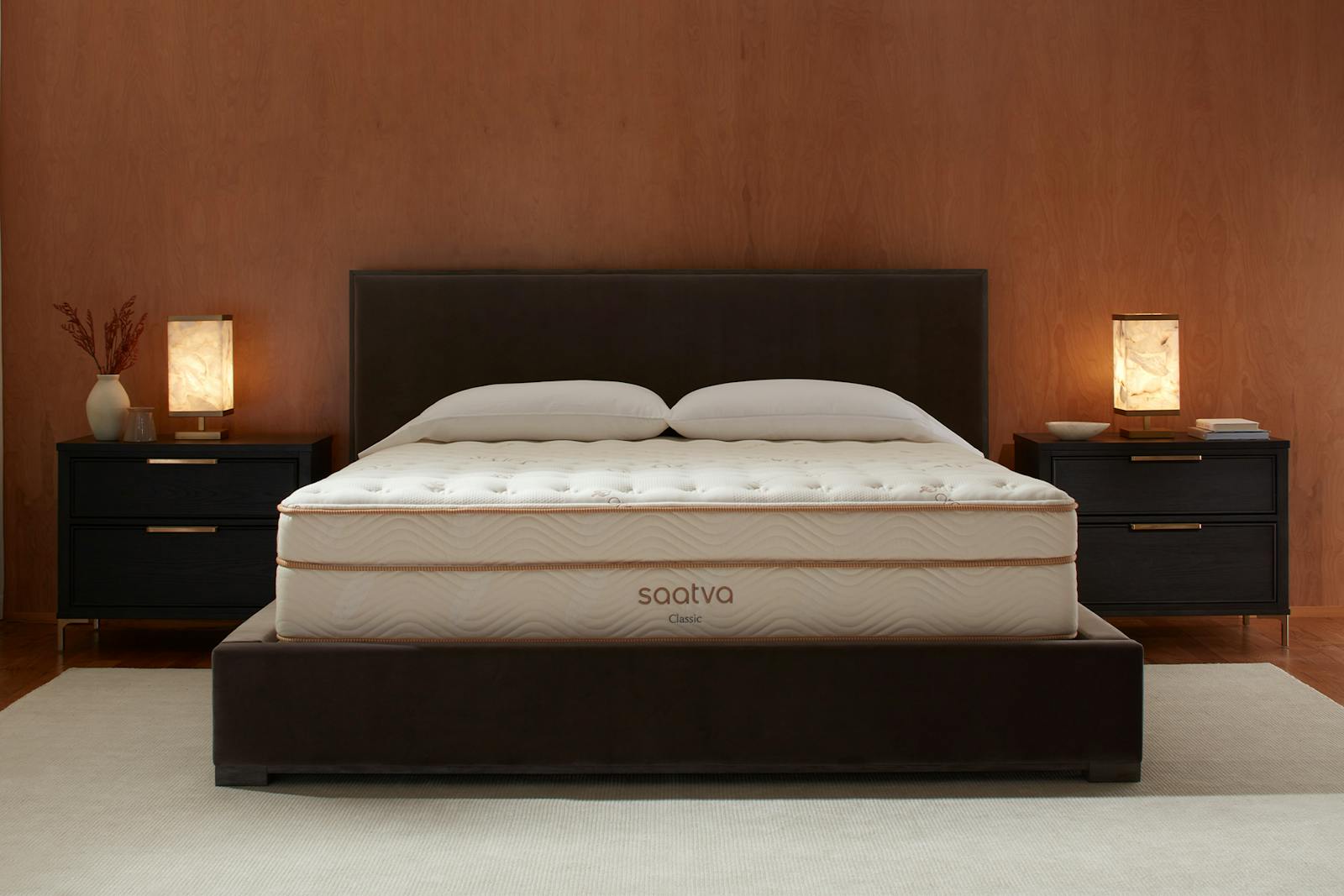 Saatva Classic mattress in a warmly lit bedroom